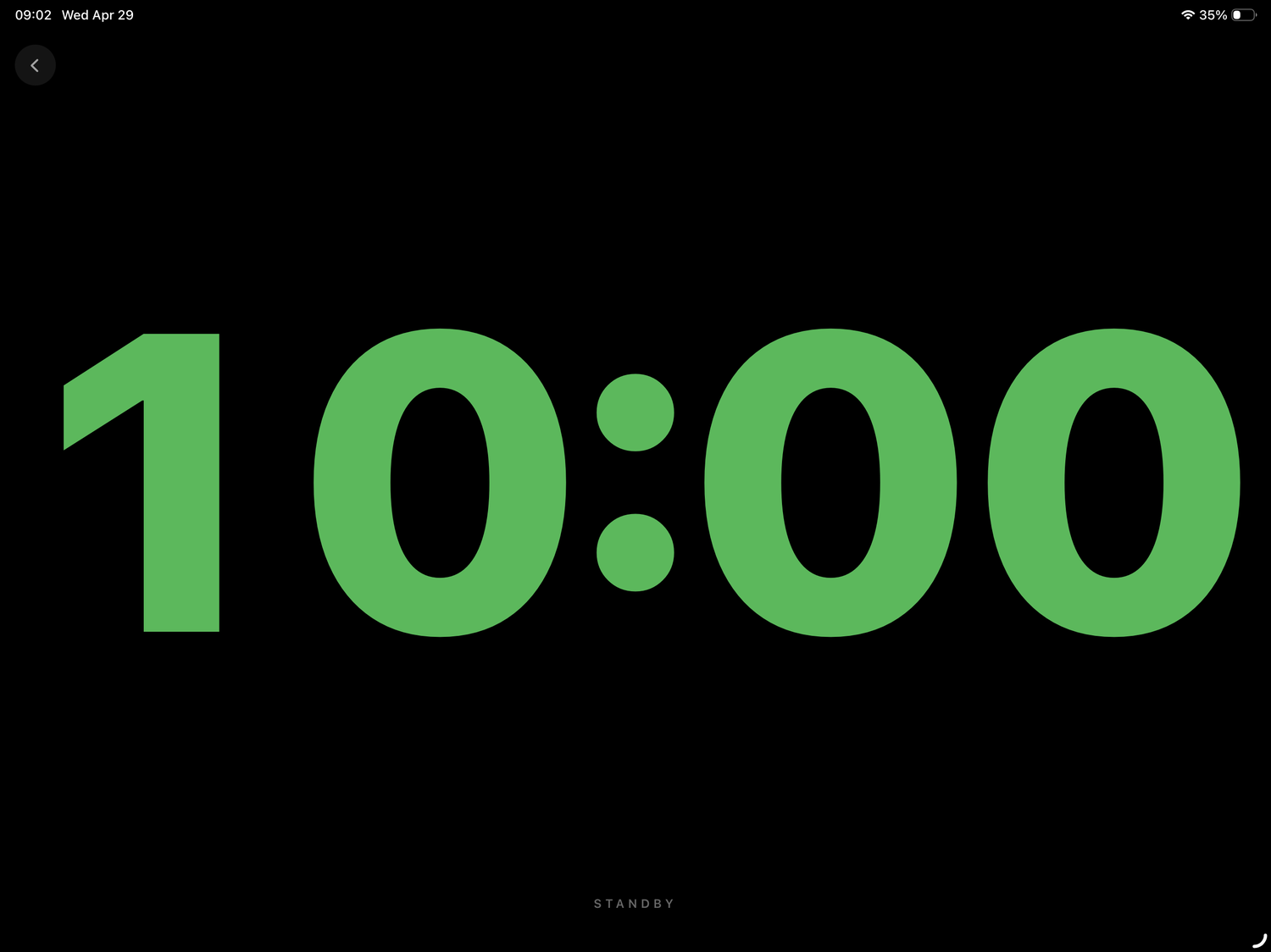 KUMA Companion Monitor view on iPad landscape — full-screen 10:00 countdown in green with STANDBY label, edge-to-edge for visibility from the back of the room
